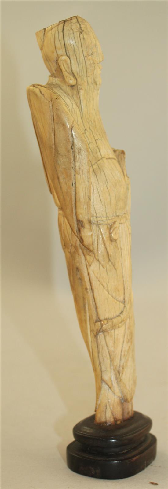 A Chinese ivory figure of an immortal, late Ming dynasty, height 21cm, slight losses and age cracks